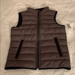 Boys grey puffer vest size 8, runs big